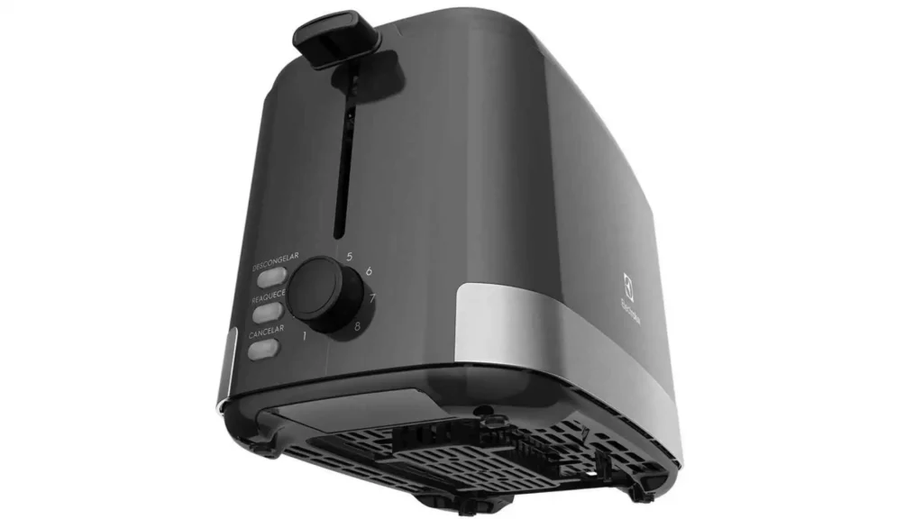 Detalhe lateral dos botões de função (Descongelar, Reaquecer, Cancelar) e seletor de 8 níveis da Torradeira Elétrica Electrolux ETS10