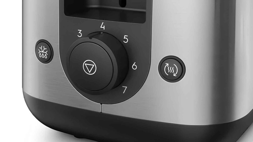 Detalhe lateral dos botões de controle e seletor de 7 níveis da torradeira Electrolux ETS25