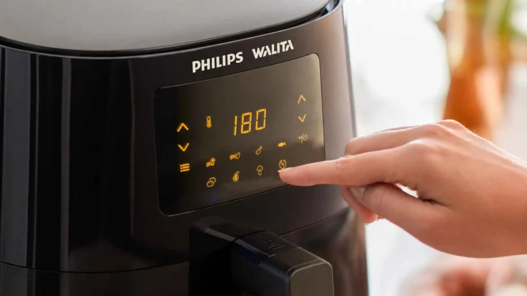 Close do painel digital touch da Airfryer Philips Walita Série 3000 mostrando 180 graus e ícones de predefinições