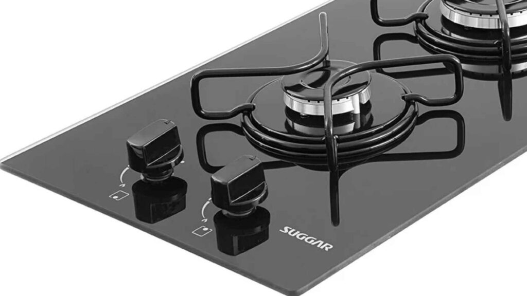 Detalhe dos botões removíveis multicontrol e das trempes individuais do Cooktop Suggar 2 Bocas FG2002AVP
