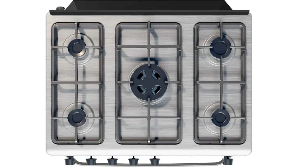 Visão de cima da mesa de inox escovado e das trempes duplas de ferro fundido do Fogão 5 Bocas Suggar Select Prata FGISL510PRIX