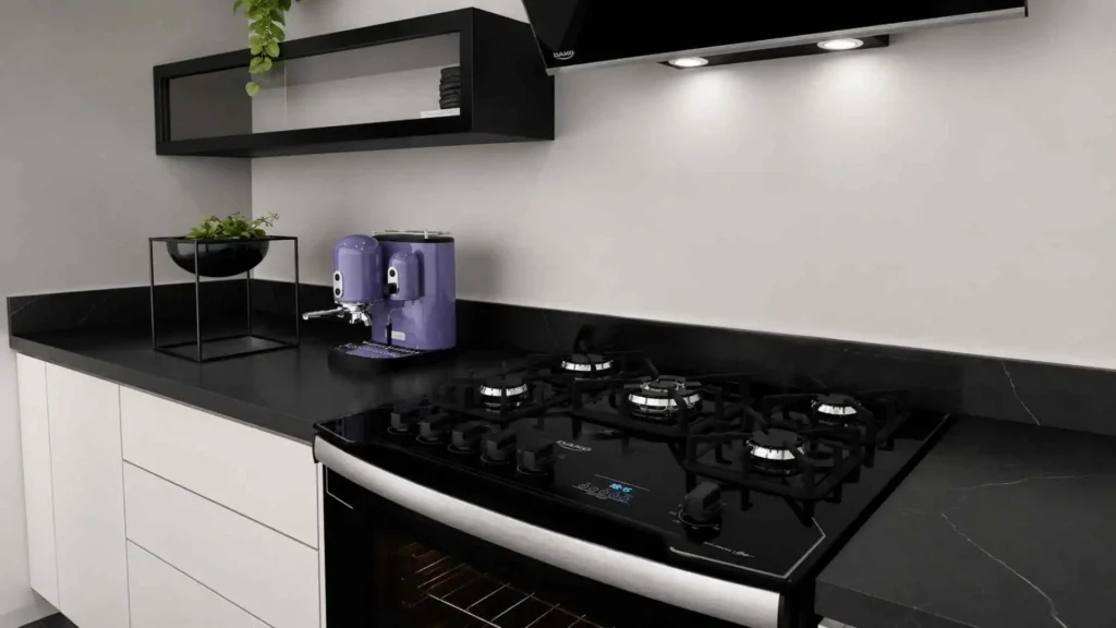 Detalhe da mesa de vidro temperado preto e trempes de ferro fundido do Fogão 5 Bocas Dako Diplomata Grill
